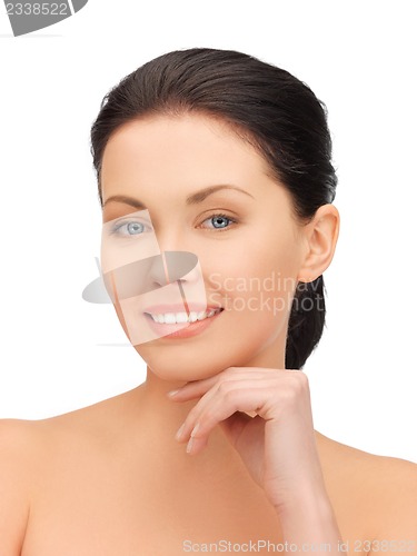 Image of face and hands of beautiful woman