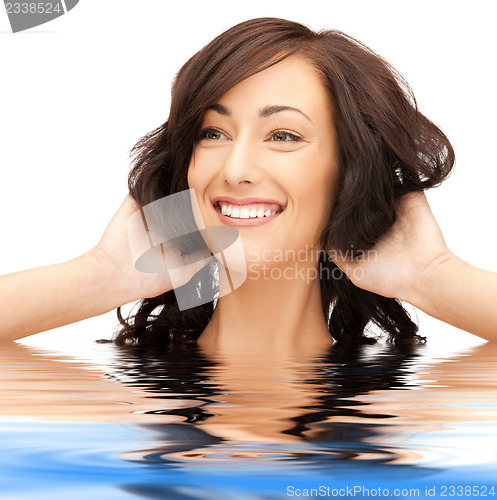 Image of beautiful woman in water