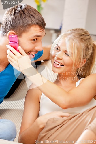 Image of happy couple at home