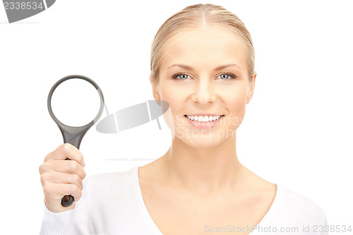 Image of woman with magnifying glass