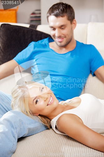 Image of happy couple at home