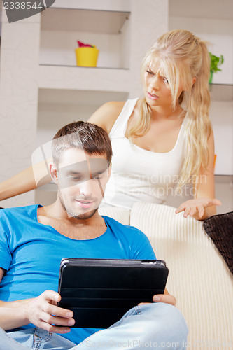 Image of couple with tablet PC