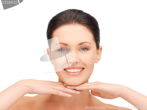 Image of face and hands of beautiful woman
