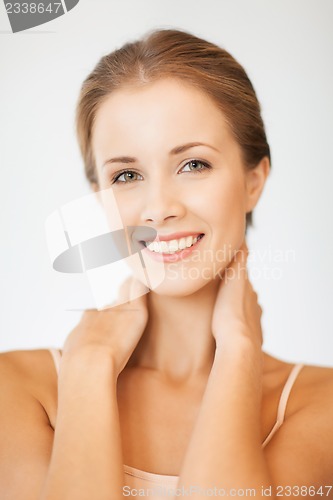 Image of face and hands of beautiful woman