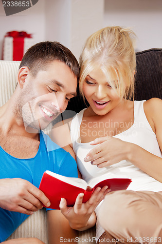 Image of happy couple at home