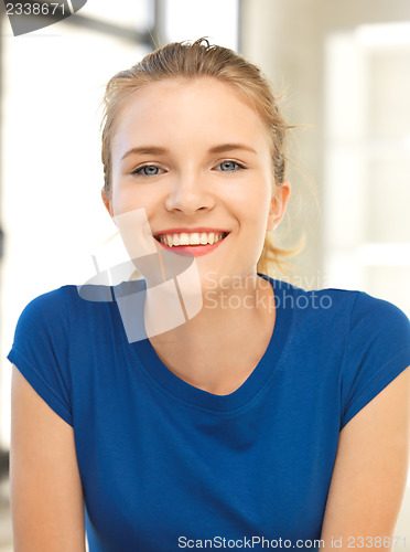 Image of happy and smiling teenage girl