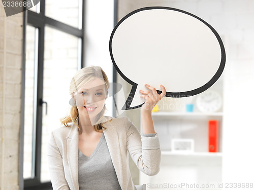 Image of smiling businesswoman with blank text bubble