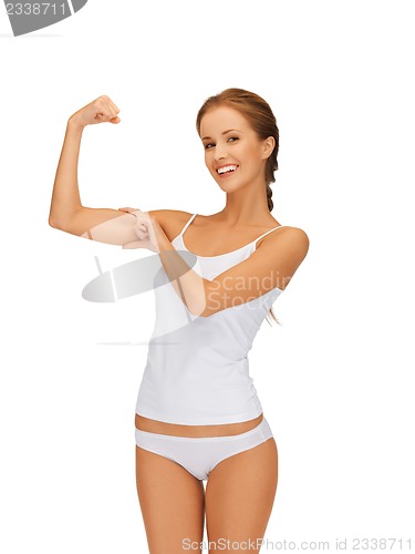 Image of woman in cotton undrewear flexing her biceps