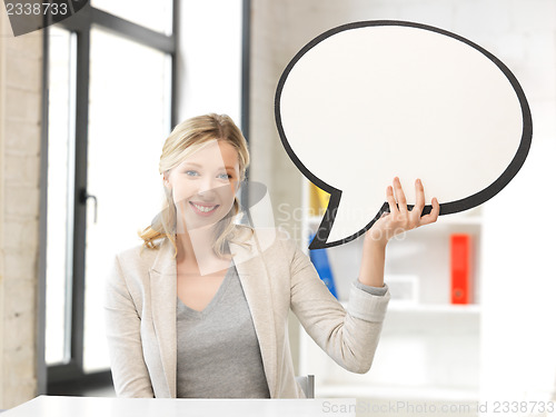 Image of smiling businesswoman with blank text bubble