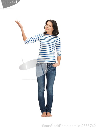 Image of woman in casual clothes showing direction