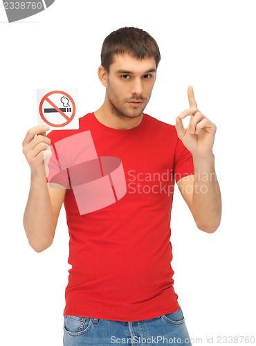 Image of man in red shirt with no smoking sign