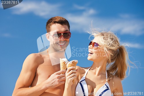 Image of happy couple with ice cream