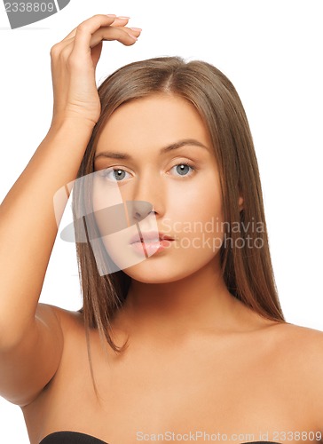 Image of worried woman with long hair