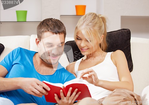 Image of happy couple at home