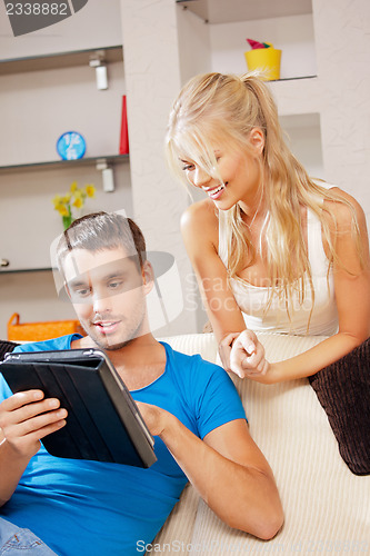 Image of happy couple at home