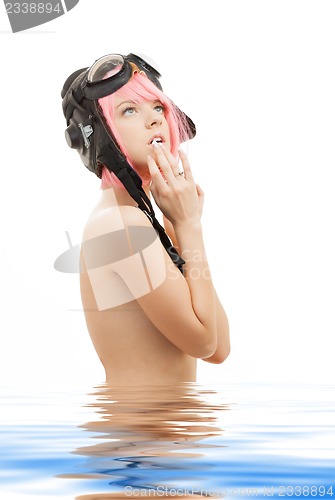 Image of topless pink hair girl in aviator helmet