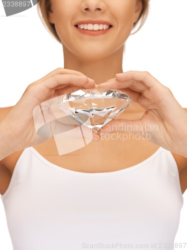 Image of smiling woman with big diamond