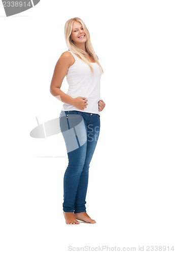 Image of smiling teenage girl in blank white t-shirt