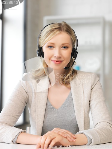 Image of friendly female helpline operator