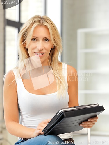 Image of happy woman with tablet pc computer