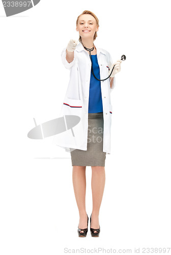 Image of attractive female doctor pointing her finger