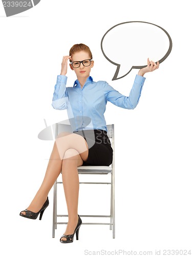 Image of pensive businesswoman with blank text bubble