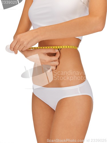 Image of woman with measure tape