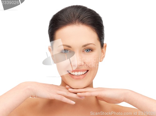 Image of face and hands of beautiful woman
