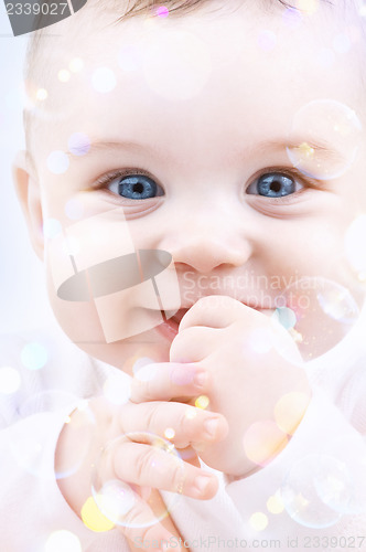 Image of baby with soap bubbles