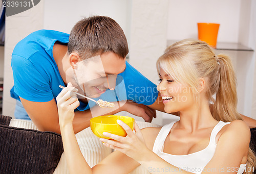 Image of happy couple at home