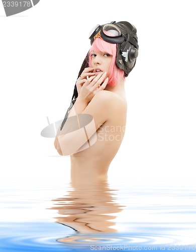 Image of topless pink hair girl in aviator helmet