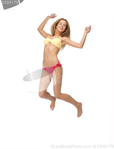 Image of picture of jumping woman in bikini