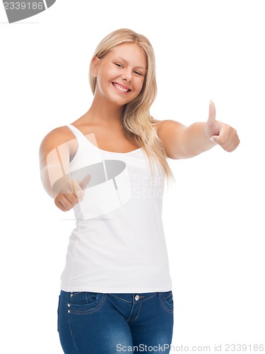 Image of teenage girl in blank white t-shirt with thumbs up