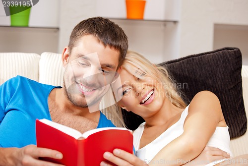 Image of happy couple at home