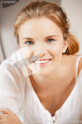Image of happy and smiling teenage girl