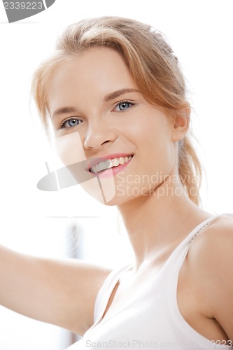 Image of happy and smiling teenage girl