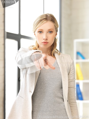 Image of businesswoman pointing her finger