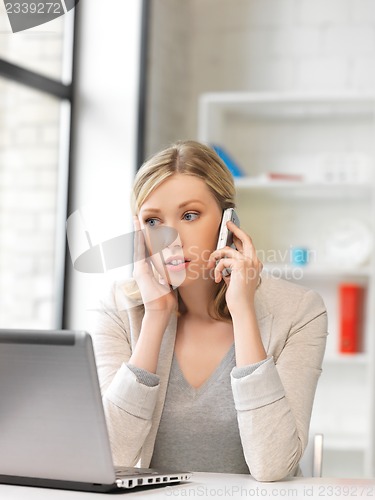 Image of businesswoman with cell phone