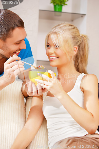 Image of happy couple at home