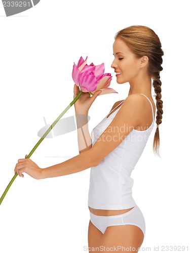 Image of lovely woman with lotus flower