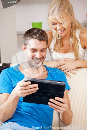 Image of happy couple at home