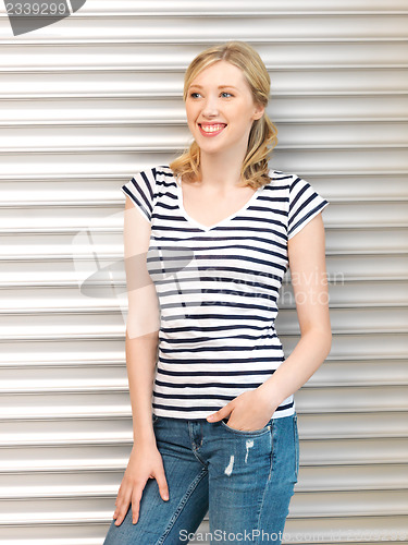 Image of happy and smiling teenage girl