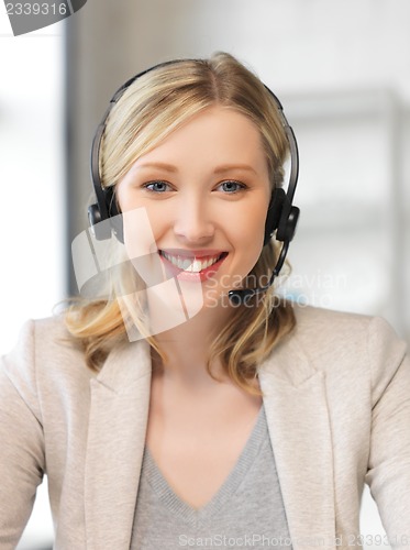 Image of friendly female helpline operator
