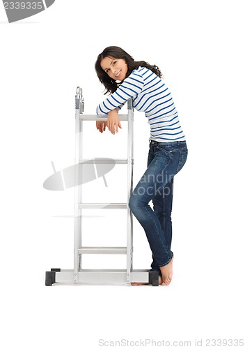 Image of beautiful woman with ladder