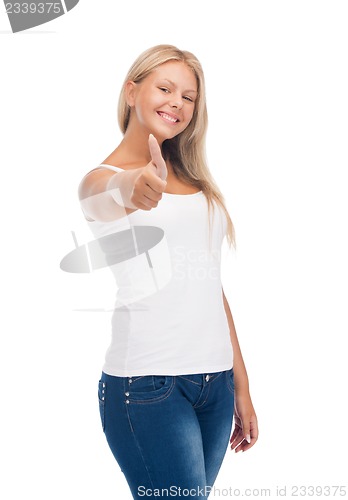 Image of teenage girl in blank white t-shirt with thumbs up