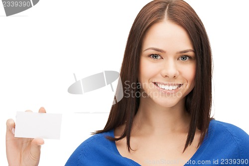 Image of attractive businesswoman with business card