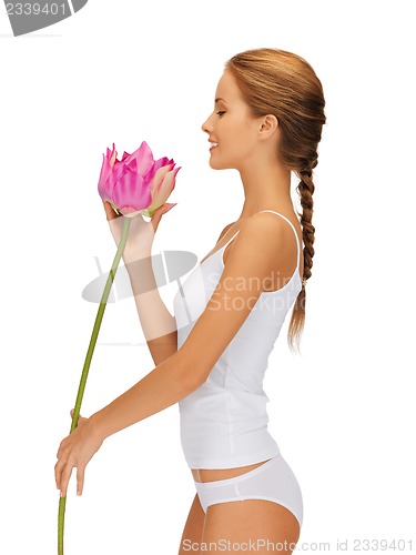 Image of lovely woman with lotus flower