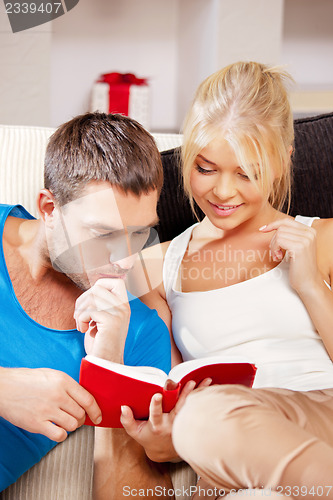 Image of happy couple at home