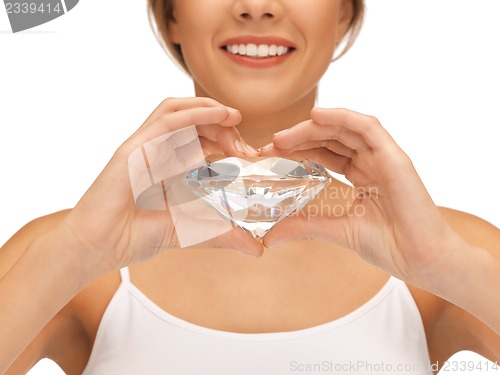 Image of smiling woman with big diamond