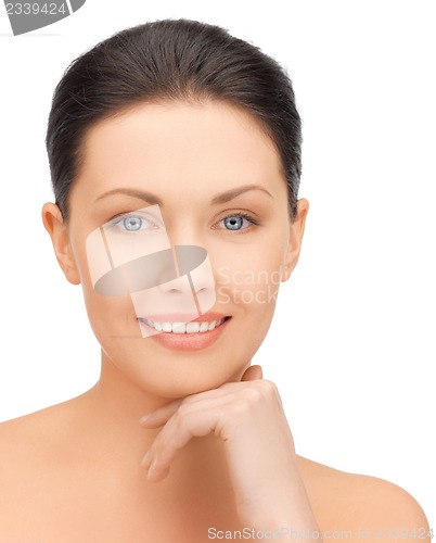 Image of face and hands of beautiful woman